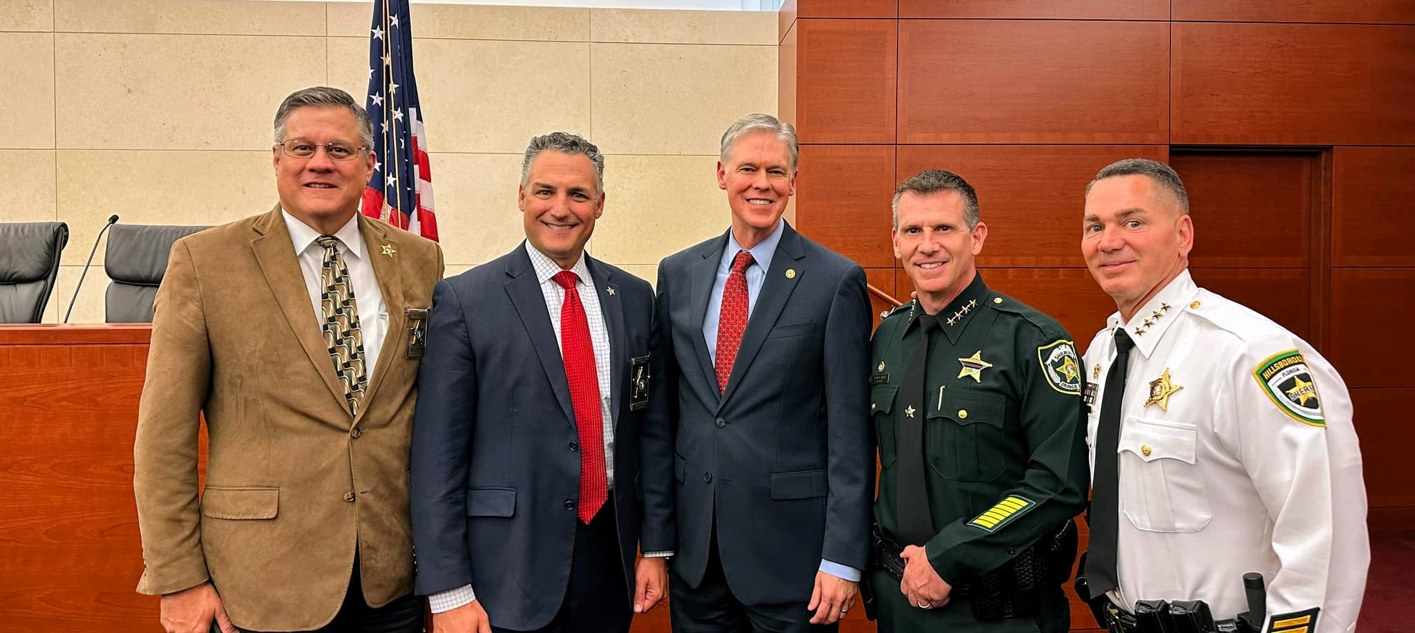 Sheriff Dennis Lemma with other politicians
